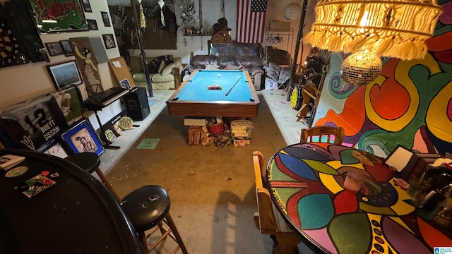 rec room with billiards and concrete floors