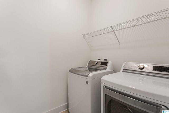 laundry area with washer and clothes dryer