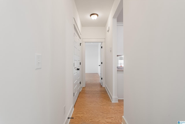 corridor featuring light wood-type flooring