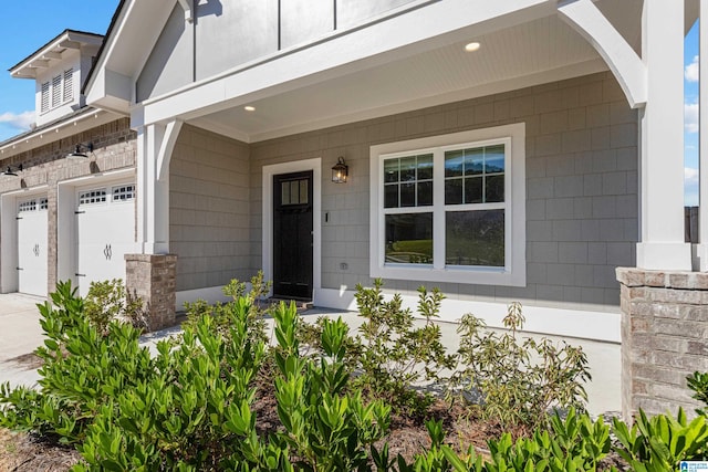 property entrance with a garage