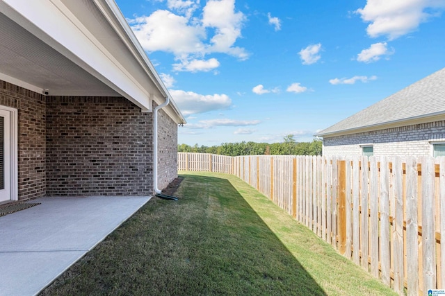 view of yard with a patio area