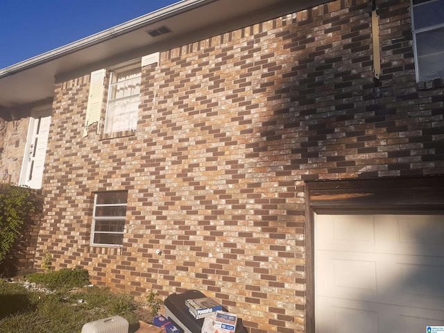 view of home's exterior with a garage