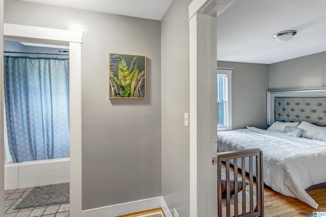 bedroom featuring light hardwood / wood-style floors