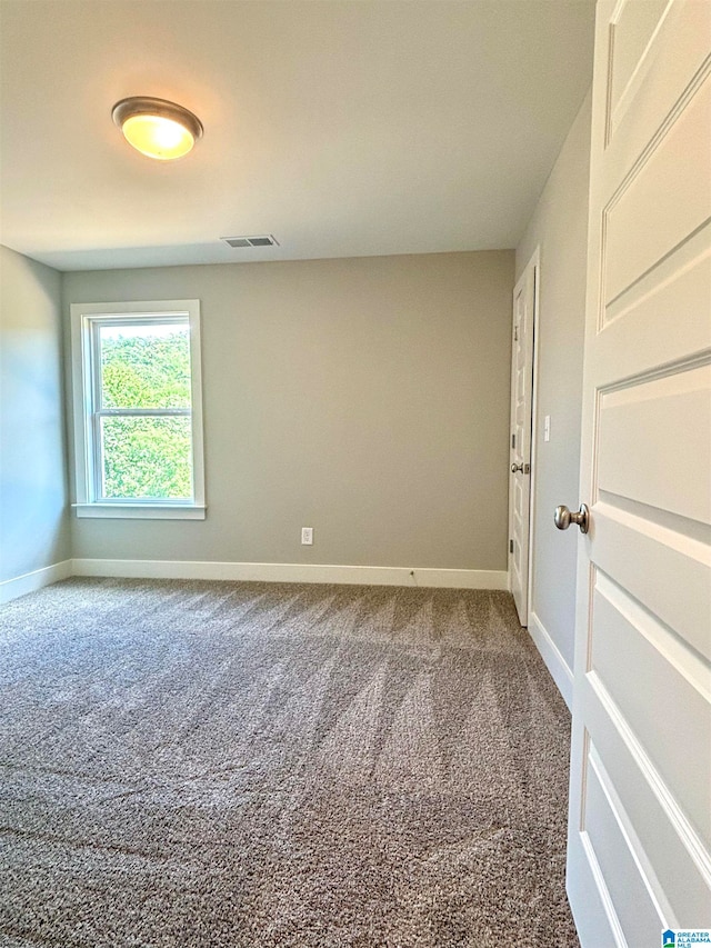 empty room featuring carpet