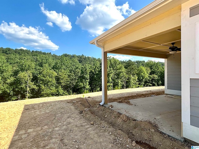 view of patio featuring ceiling fan