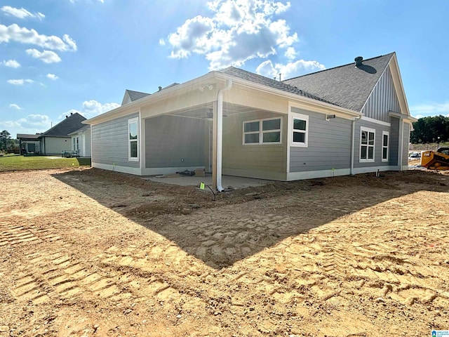 back of property featuring a patio area