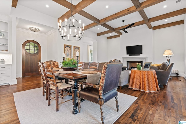 dining area featuring ceiling fan with notable chandelier, beamed ceiling, coffered ceiling, and wood-type flooring