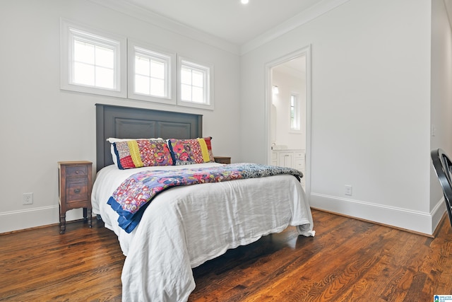 bedroom with ornamental molding, connected bathroom, multiple windows, and dark wood-type flooring