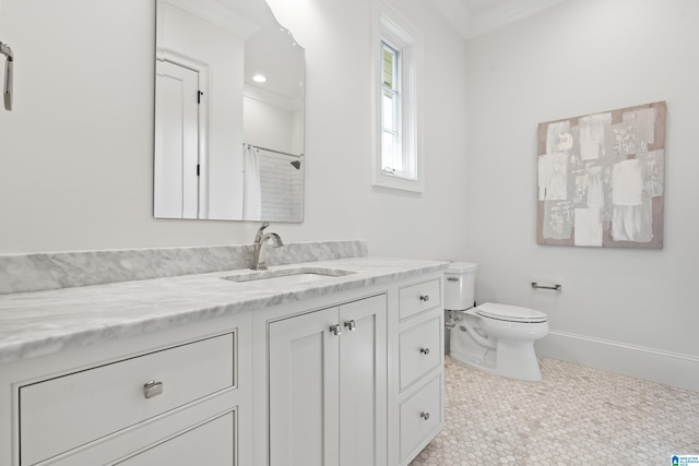 bathroom with a shower with curtain, vanity, toilet, and tile patterned floors