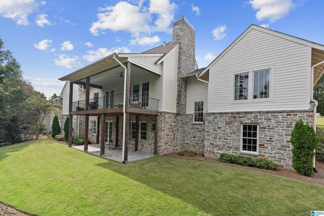 view of front facade with a front yard and a garage