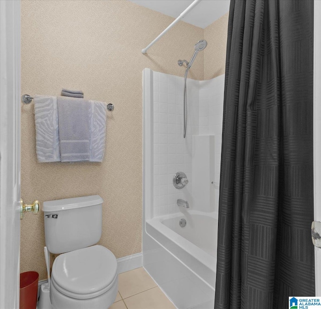 bathroom featuring toilet, tile patterned floors, and shower / bathtub combination with curtain