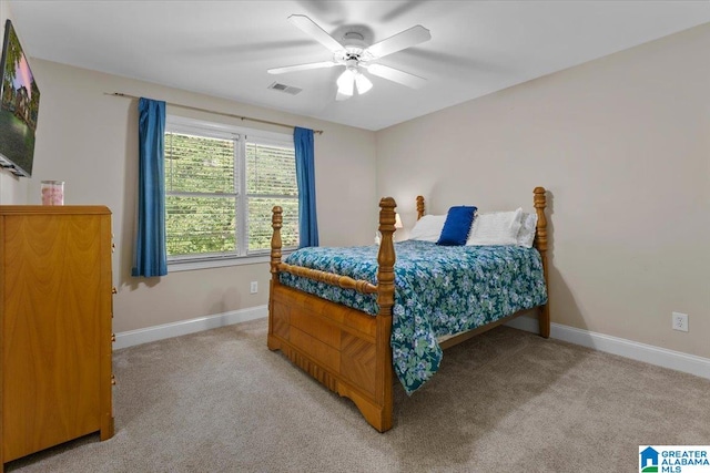 carpeted bedroom featuring ceiling fan