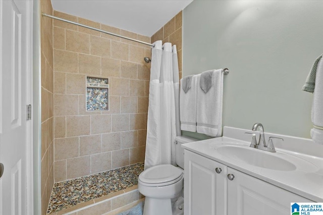 bathroom with vanity, a shower with curtain, and toilet