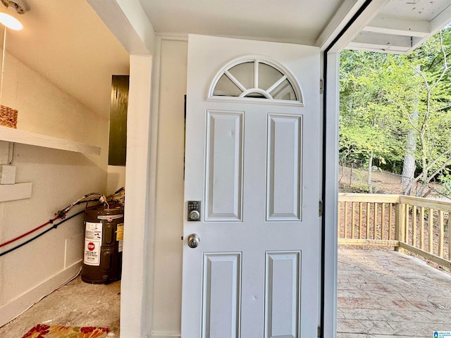 entrance to property featuring water heater