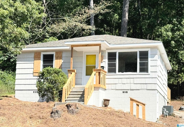 view of front facade featuring central air condition unit