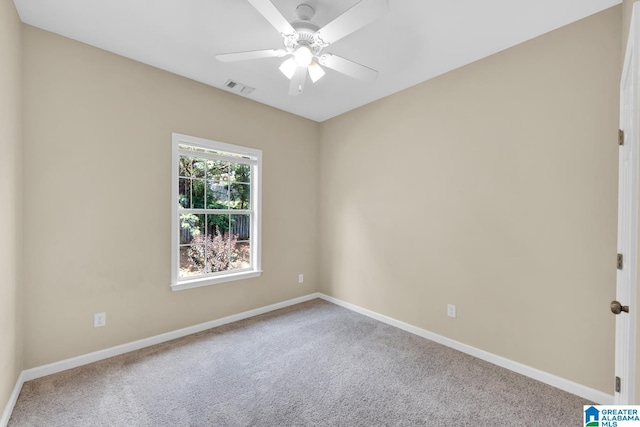 empty room with carpet and ceiling fan