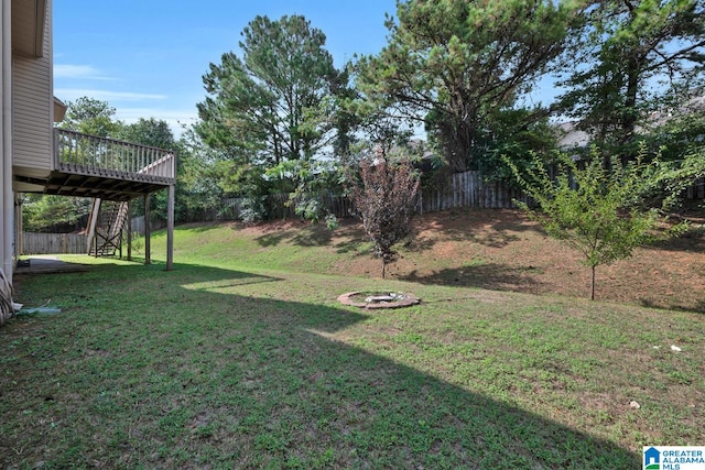 view of yard with a deck