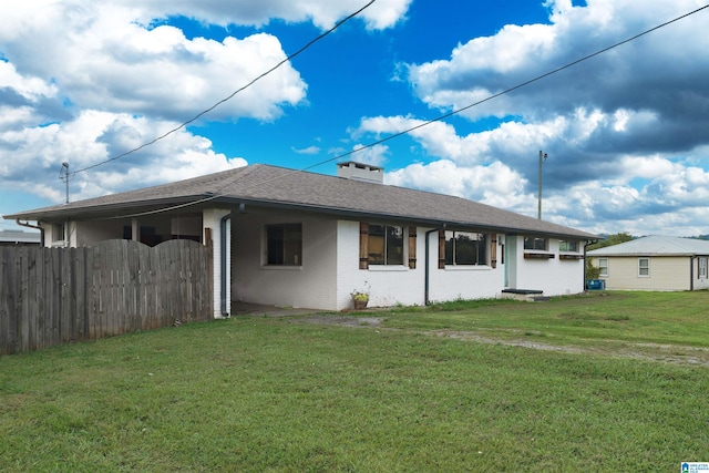 ranch-style home with a front yard