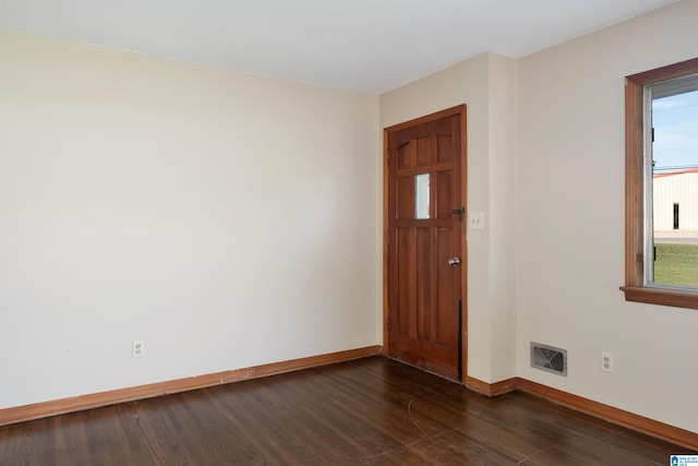 entryway featuring dark wood-type flooring