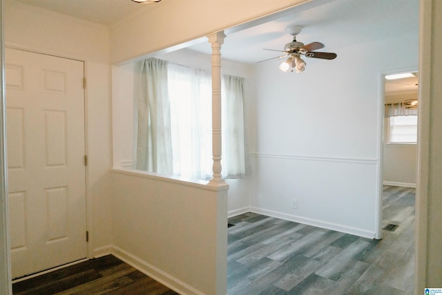 entrance foyer with dark hardwood / wood-style flooring, ceiling fan, and plenty of natural light