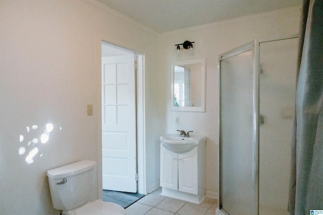 bathroom featuring vanity, walk in shower, tile patterned flooring, ornamental molding, and toilet