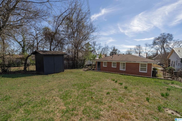 view of yard with a storage unit