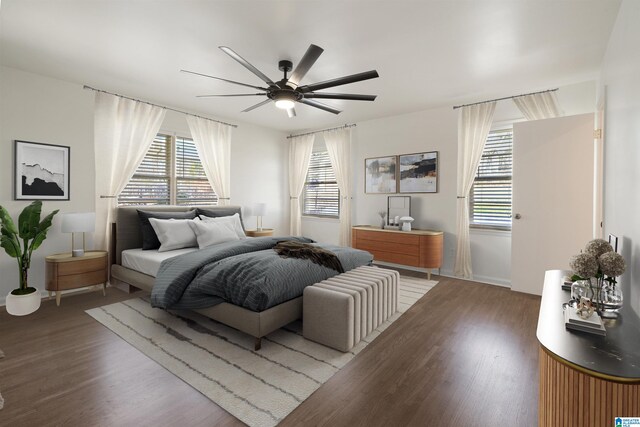 bedroom featuring hardwood / wood-style floors and ceiling fan