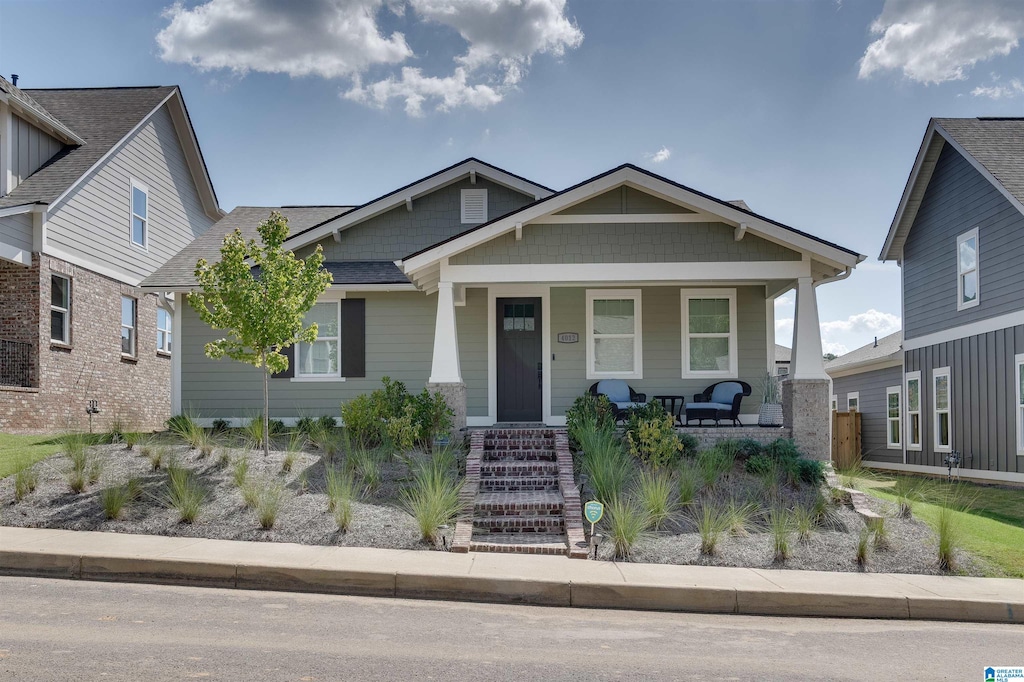 craftsman house featuring covered porch