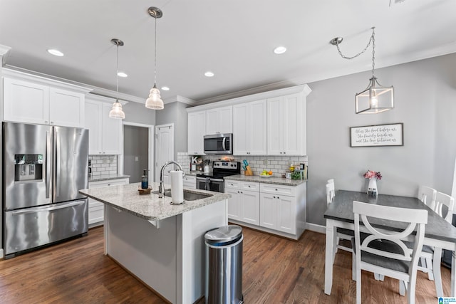 kitchen with appliances with stainless steel finishes, sink, dark hardwood / wood-style floors, and white cabinets