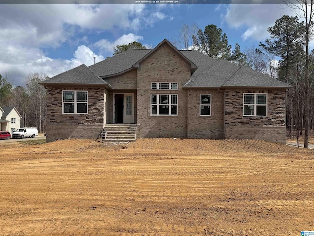 1121 Grey Oaks Vly, Pelham, AL 35124 - view of front facade with a shingled roof and brick siding