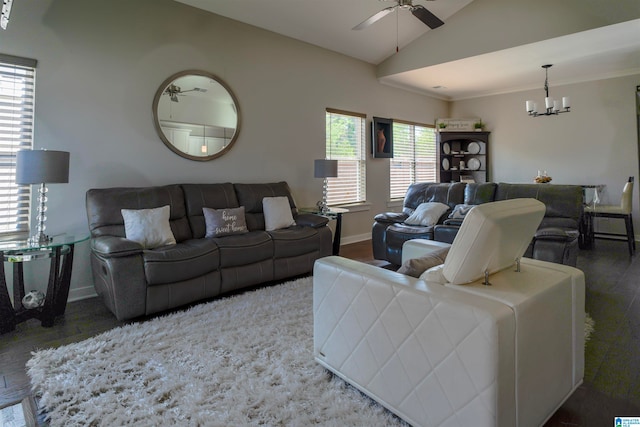 living room with lofted ceiling, hardwood / wood-style flooring, and a healthy amount of sunlight