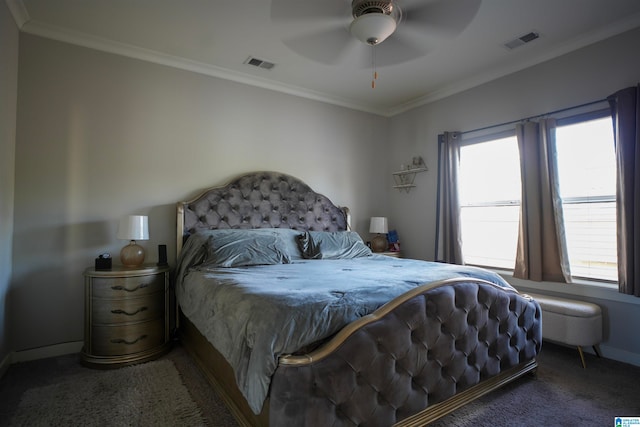 bedroom with crown molding, carpet, and ceiling fan