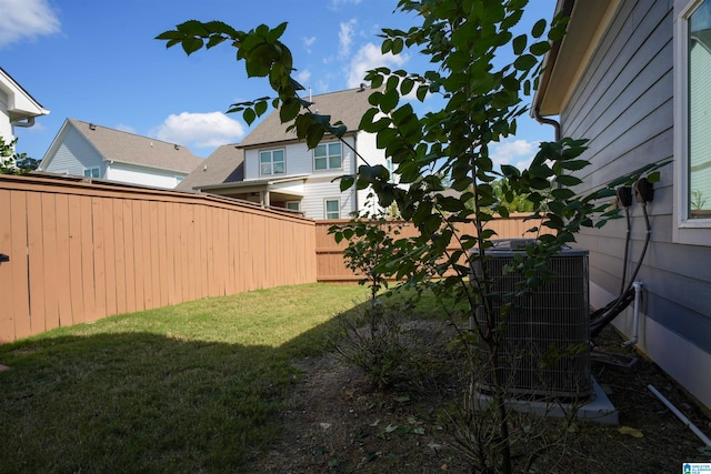 view of yard with central AC