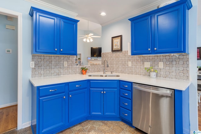 kitchen featuring dishwasher, blue cabinets, and sink