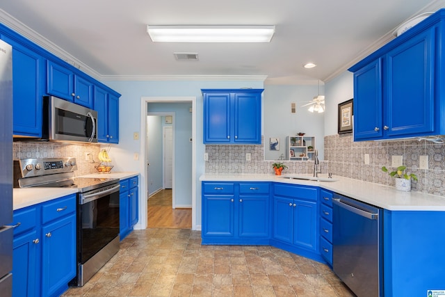 kitchen featuring ceiling fan, blue cabinets, sink, and appliances with stainless steel finishes