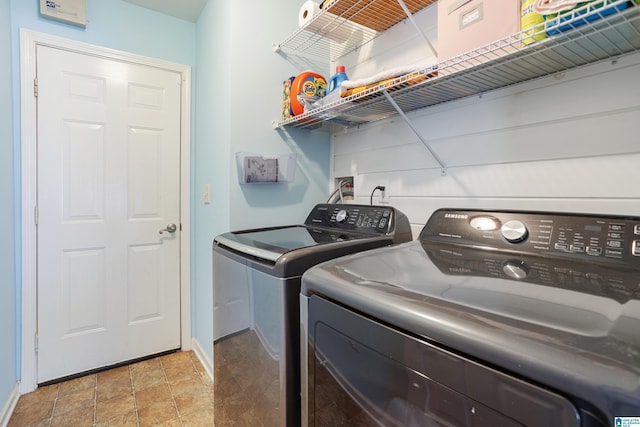 laundry room featuring separate washer and dryer