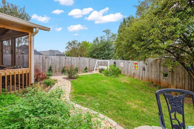 view of yard with a sunroom