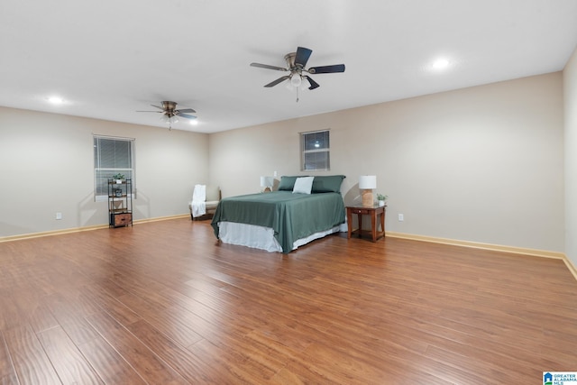 bedroom with recessed lighting, baseboards, a ceiling fan, and light wood-type flooring