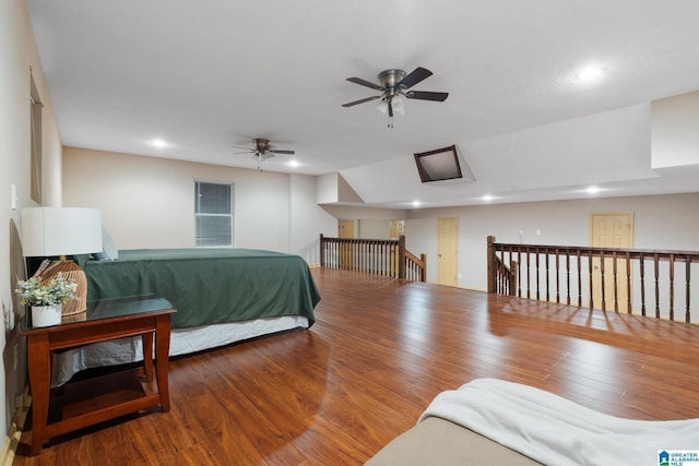 bedroom featuring recessed lighting and wood finished floors