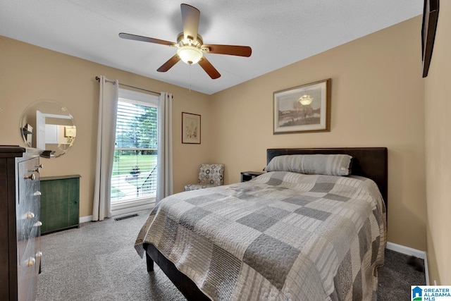 bedroom featuring ceiling fan and carpet floors