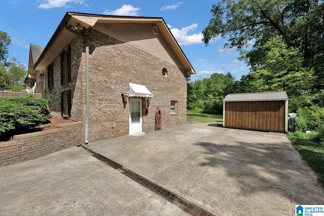 view of property exterior featuring a patio area