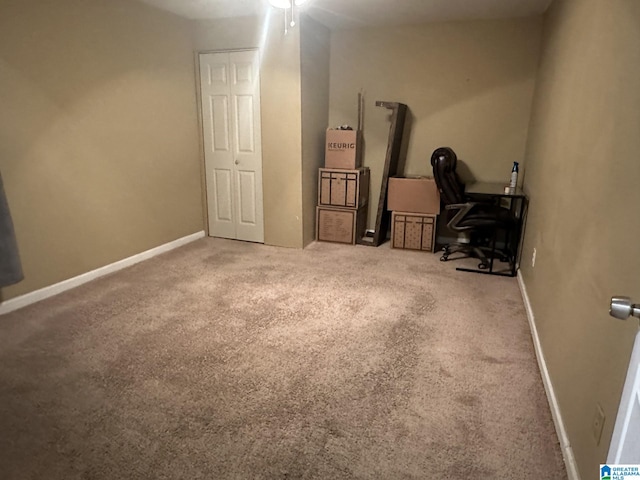 interior space featuring carpet