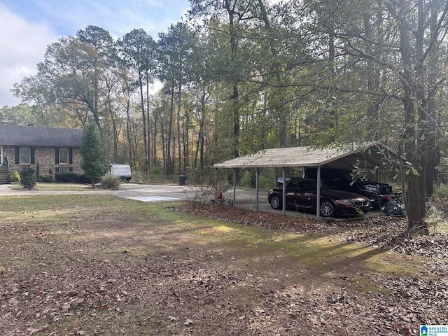 view of yard with a carport