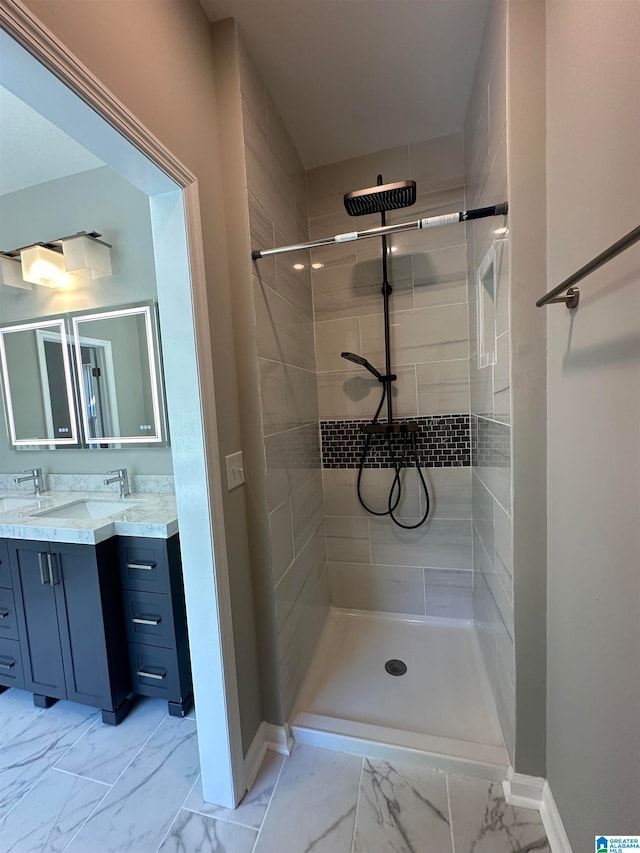 bathroom featuring vanity and a tile shower