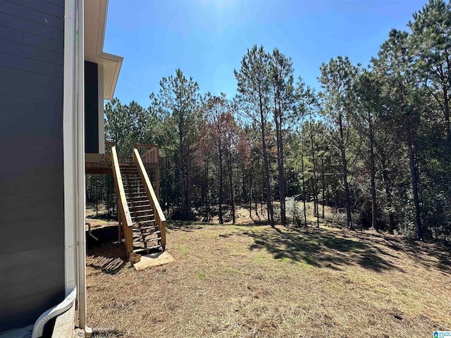 view of yard with a wooden deck