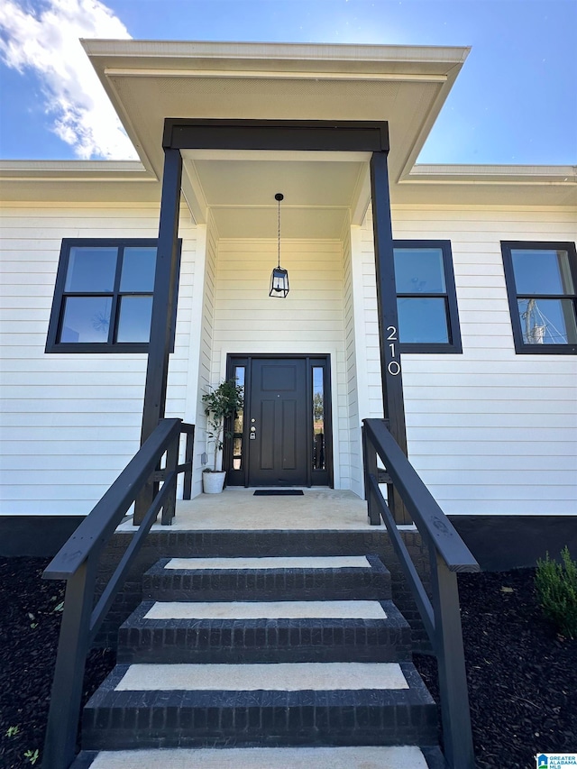 entrance to property with covered porch