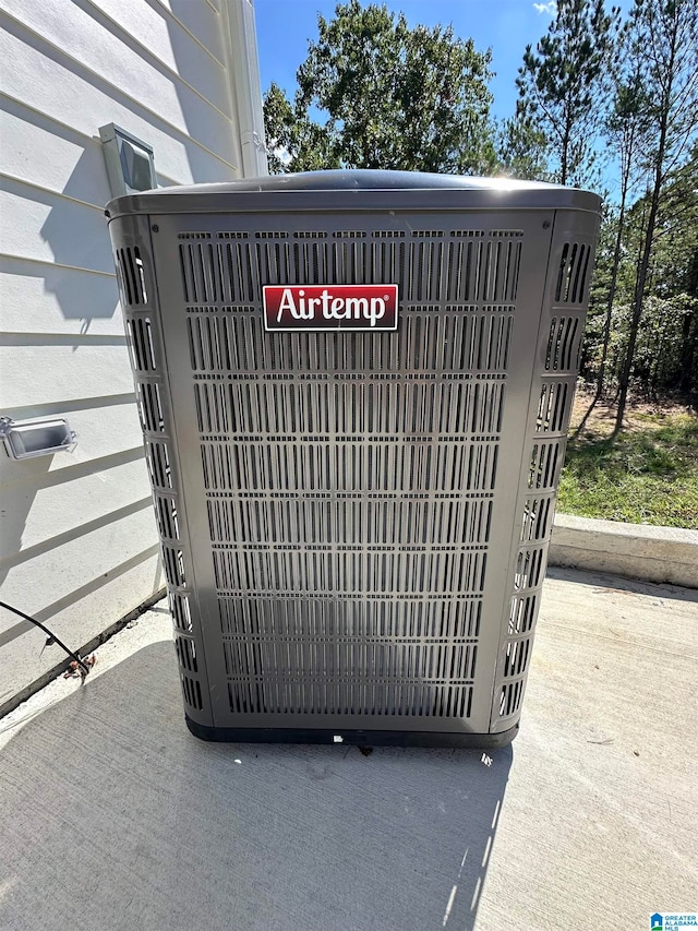 exterior details featuring carpet floors and central air condition unit