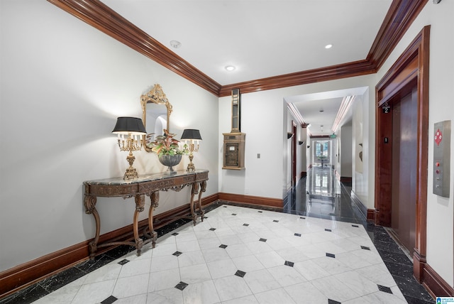 foyer entrance with ornamental molding and elevator