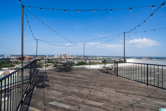 wooden deck with a water view