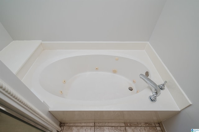 bathroom featuring tiled tub